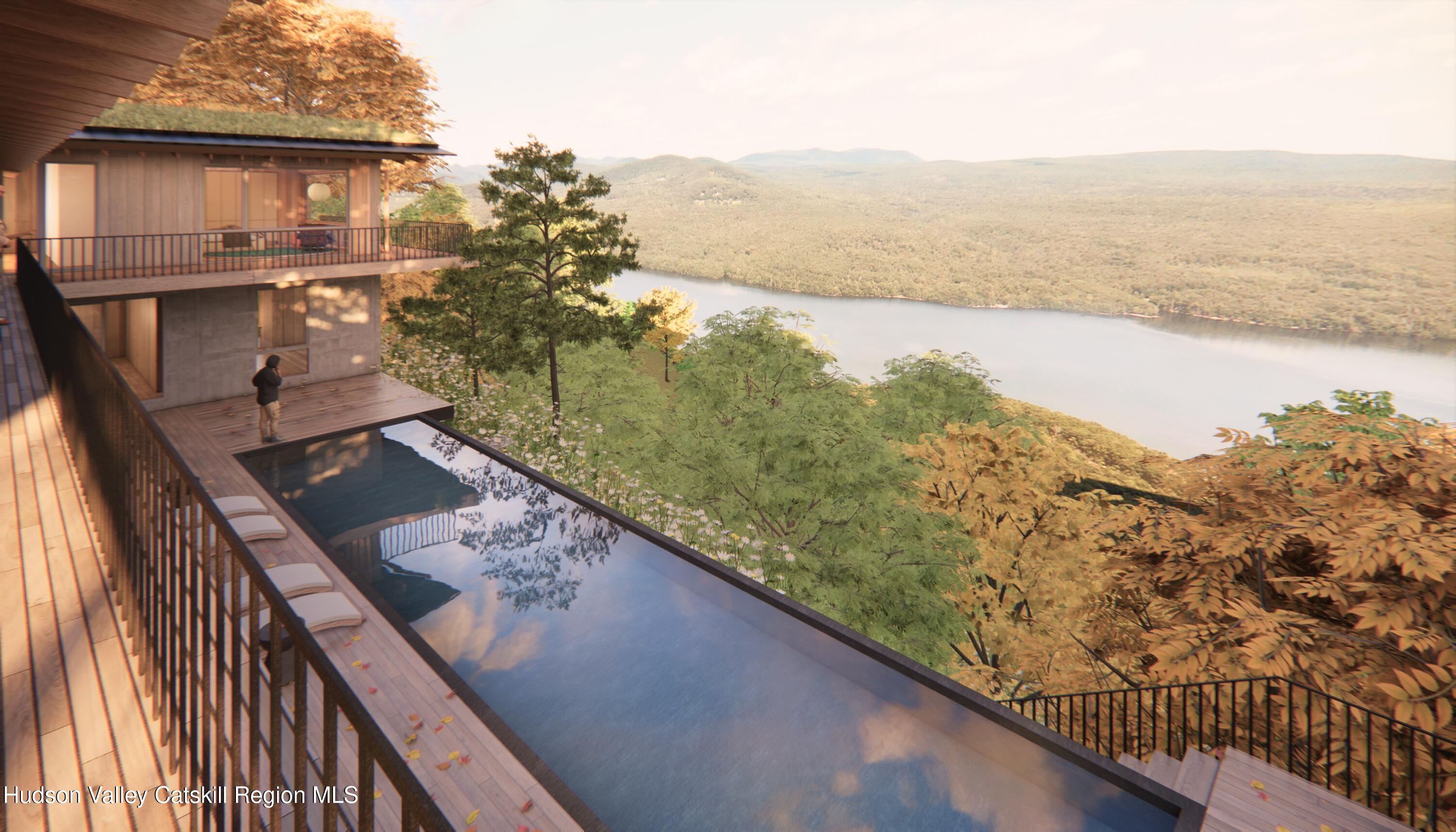 4 Red Rock Road New City, NY 10956 - Photo 3 of 14 a view of a lake from a balcony