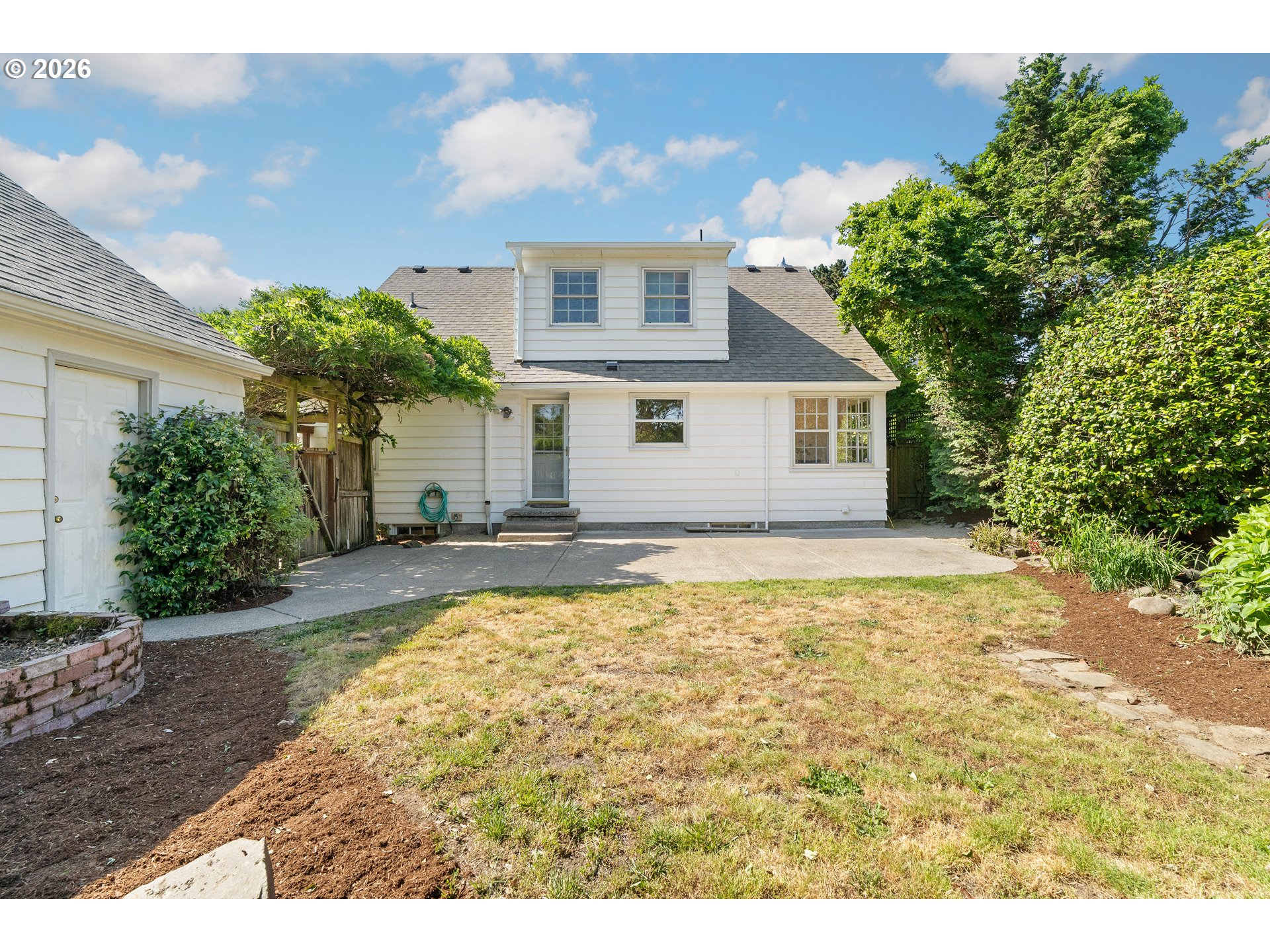 7541 Northeast Alameda Street Portland, OR 97213 - Photo 29 of 35 a view of a house with a yard