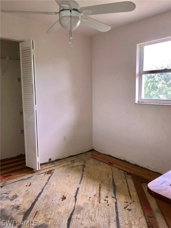 7206 Jasmine Road Fort Myers, FL 33967 - Photo 19 of 29 a view of a room with rack on the wall and a window