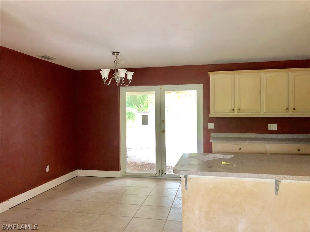 7206 Jasmine Road Fort Myers, FL 33967 - Photo 6 of 29 a view of a kitchen with a sink and cabinets
