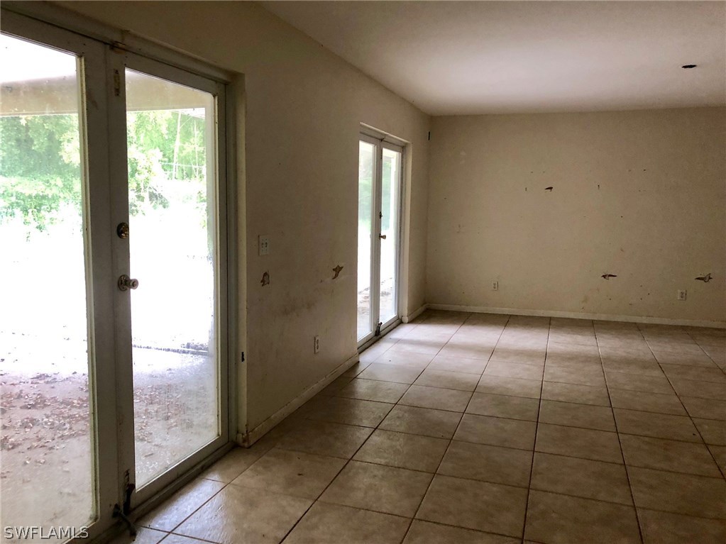 7206 Jasmine Road Fort Myers, FL 33967 - Photo 9 of 29 a view of an empty room and window