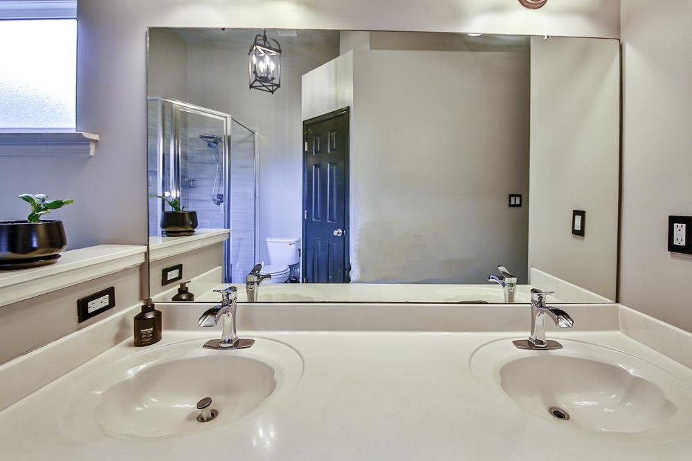 4736 Ridge Walk Lane Memphis, TN 38125 - Photo 14 of 23 Bathroom featuring dual vanity and toilet
