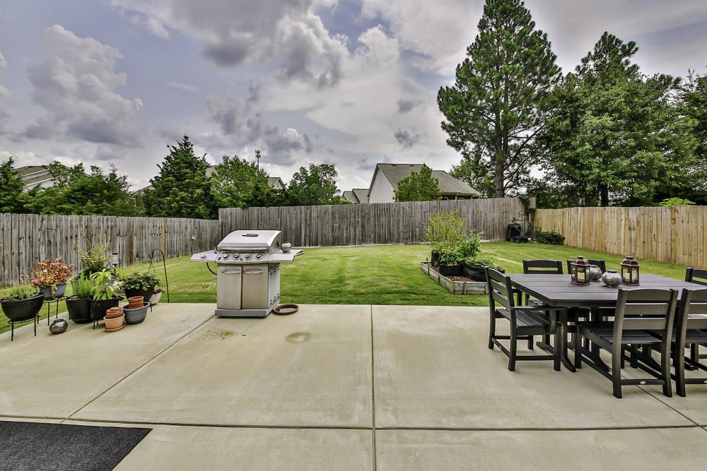 4736 Ridge Walk Lane Memphis, TN 38125 - Photo 23 of 23 View of patio with area for grilling