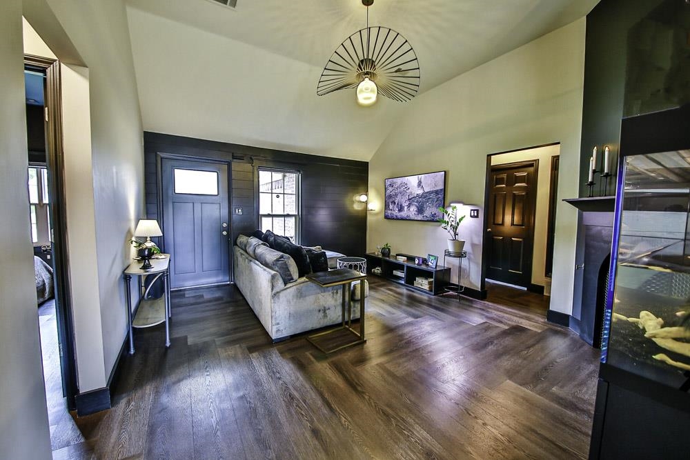 4736 Ridge Walk Lane Memphis, TN 38125 - Photo 4 of 23 Living room with dark hardwood / wood-style flooring and lofted ceiling