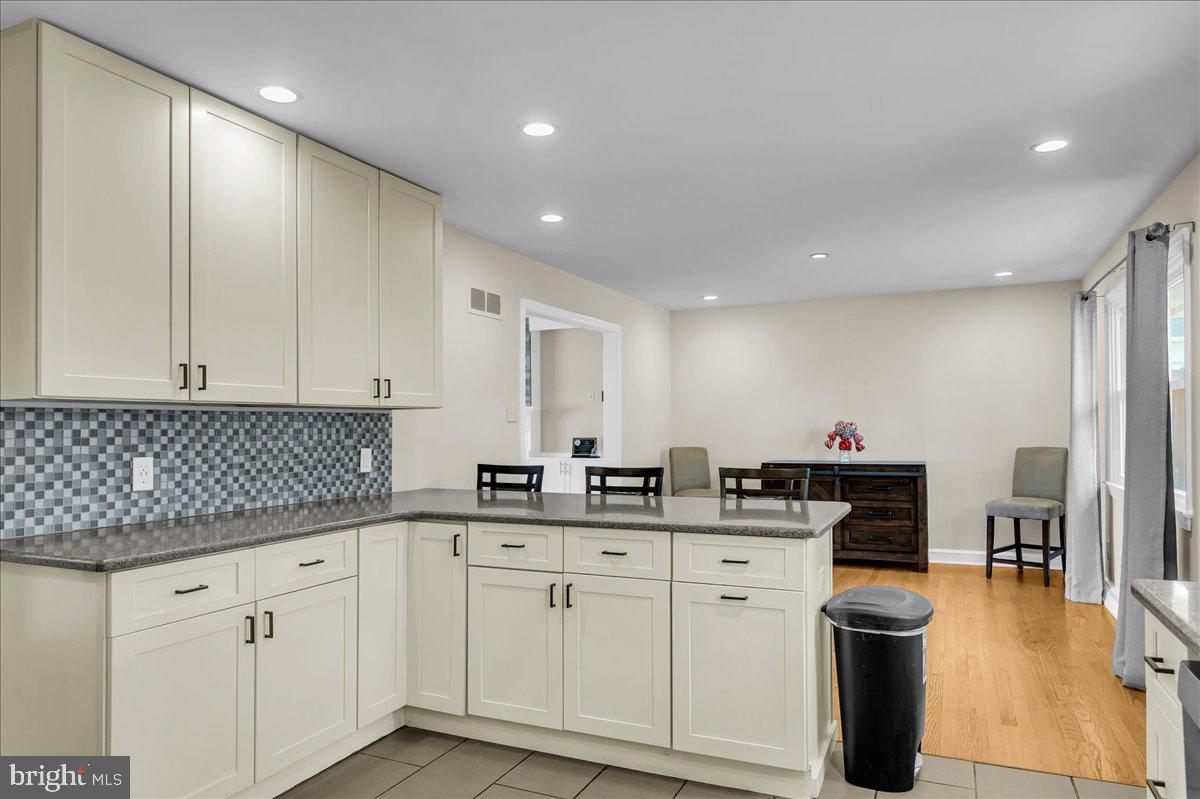 1909 Foulk Road Wilmington, DE 19810 - Photo 11 of 31 a kitchen with stainless steel appliances a sink stove and cabinets