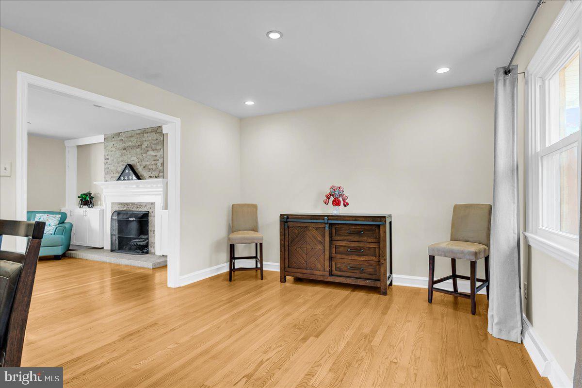 1909 Foulk Road Wilmington, DE 19810 - Photo 12 of 31 a living room with furniture and a fireplace
