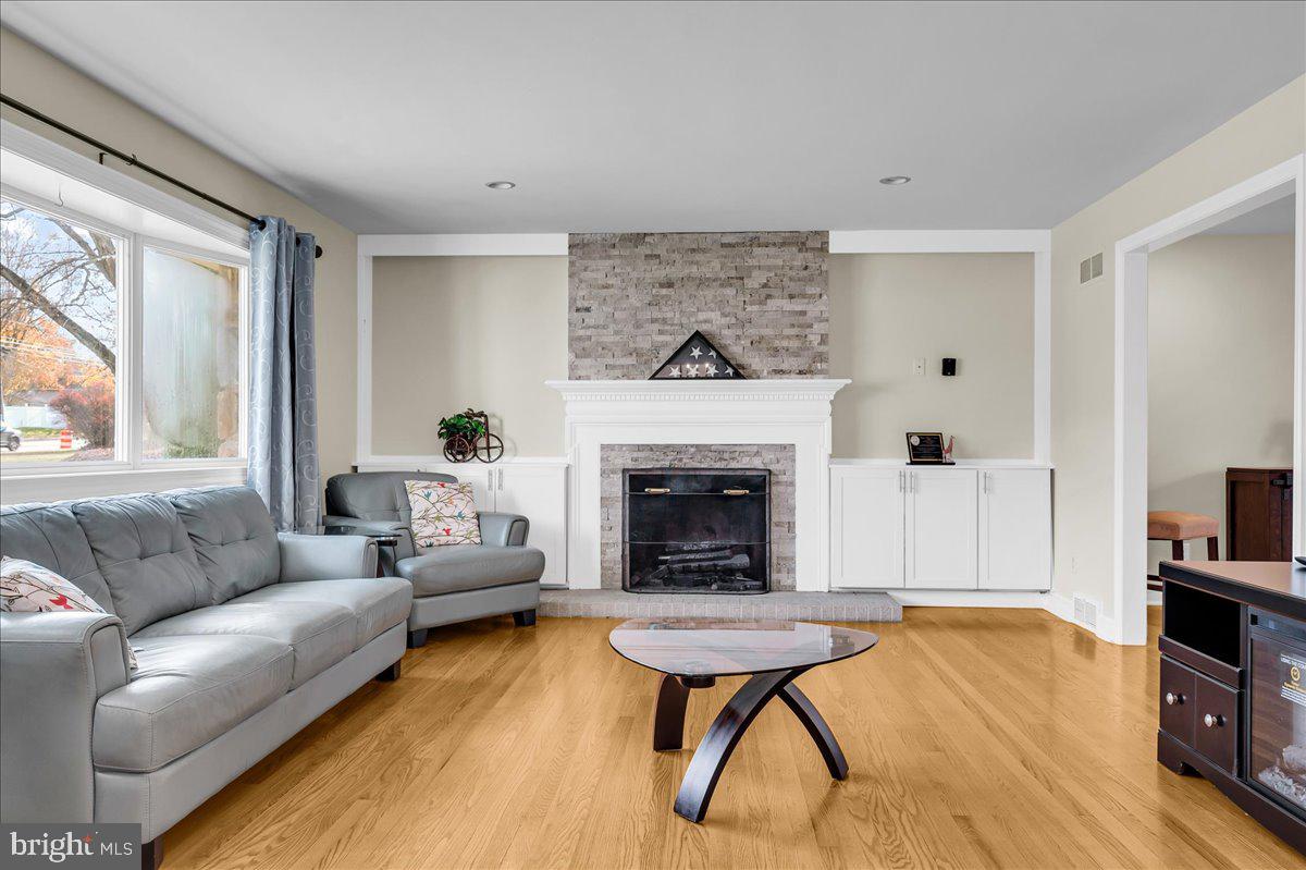 1909 Foulk Road Wilmington, DE 19810 - Photo 14 of 31 a living room with furniture and a fireplace