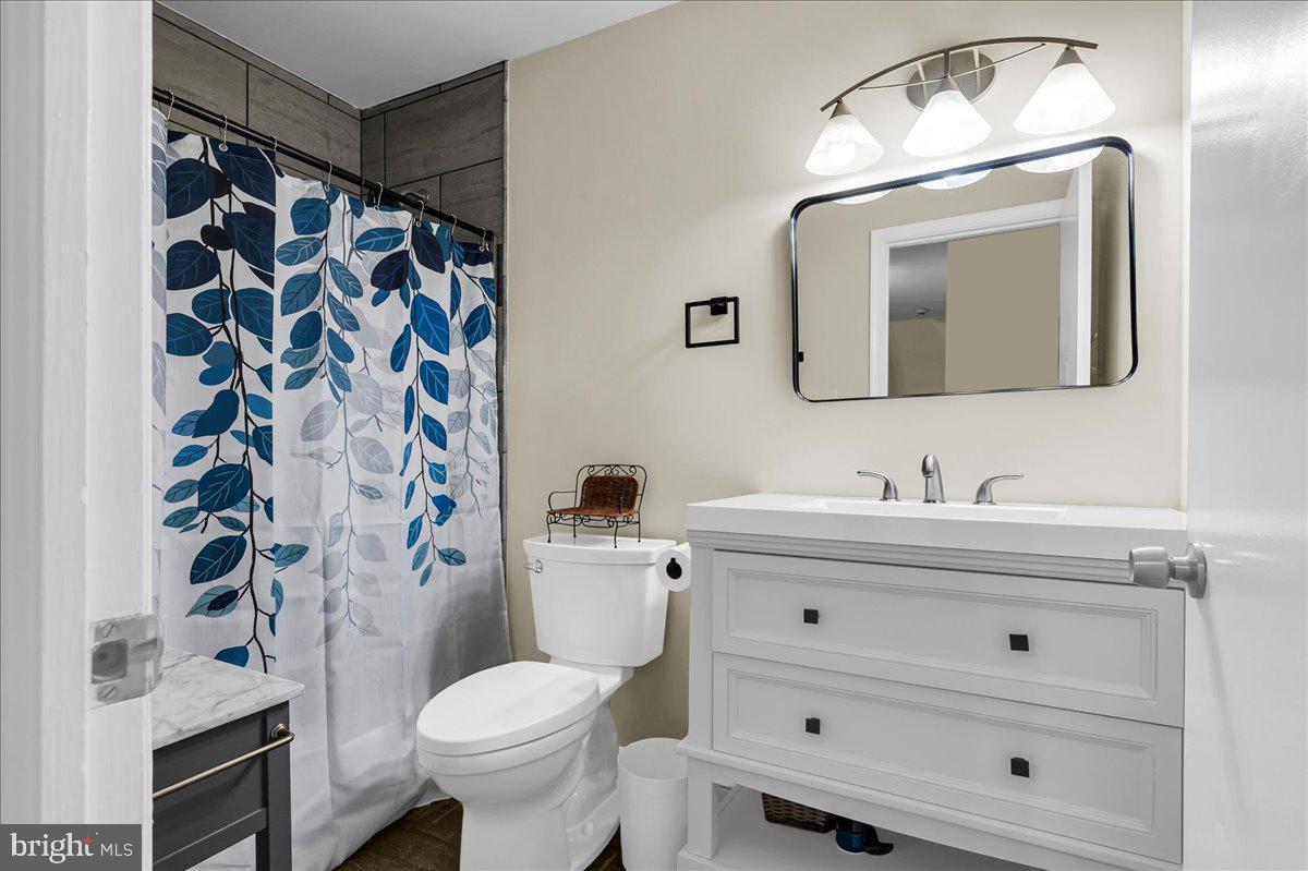 1909 Foulk Road Wilmington, DE 19810 - Photo 21 of 31 a bathroom with a sink toilet and shower