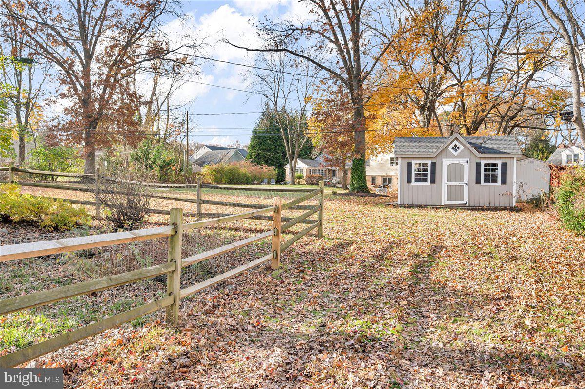 1909 Foulk Road Wilmington, DE 19810 - Photo 23 of 31 a view of a house with a yard covered with snow in the center