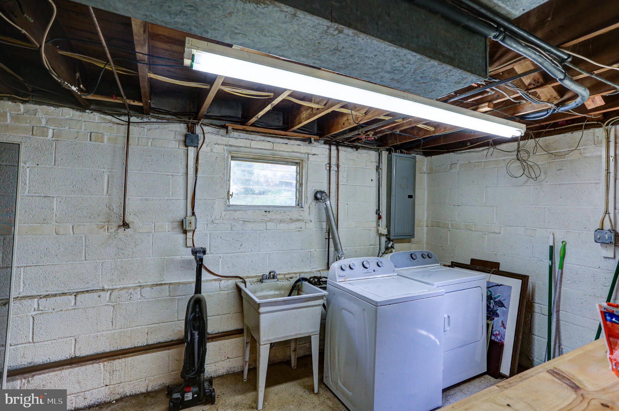 125 West Thomson Avenue Springfield, PA 19064 - Photo 27 of 41 Bright and functional laundry space.