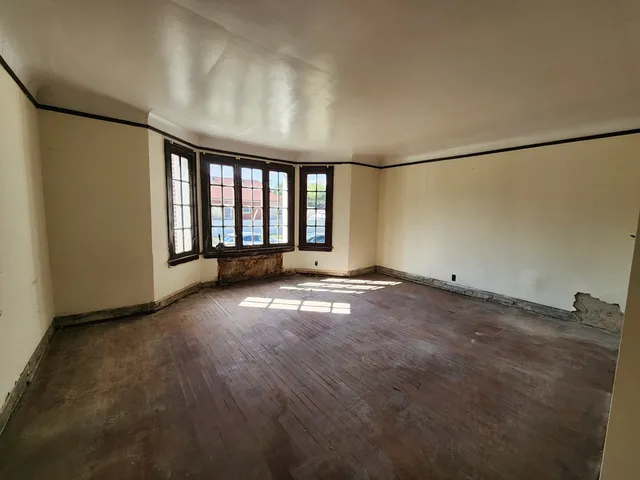 an empty room with windows