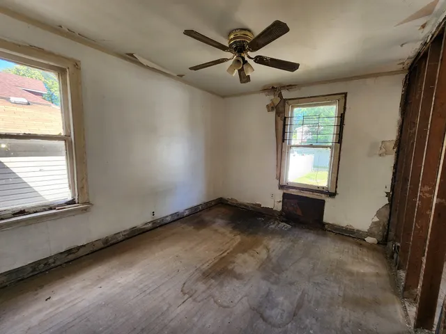 an empty room with windows