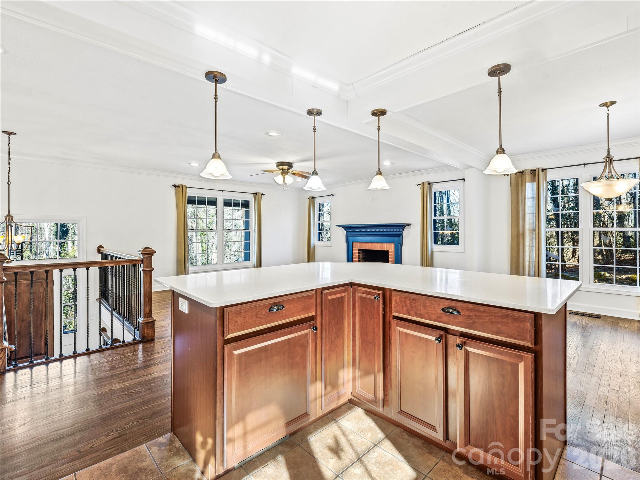 2388 Hebron Road Hendersonville, NC 28739 - Photo 19 of 42 a kitchen with stainless steel appliances granite countertop a stove a sink and a wooden floors
