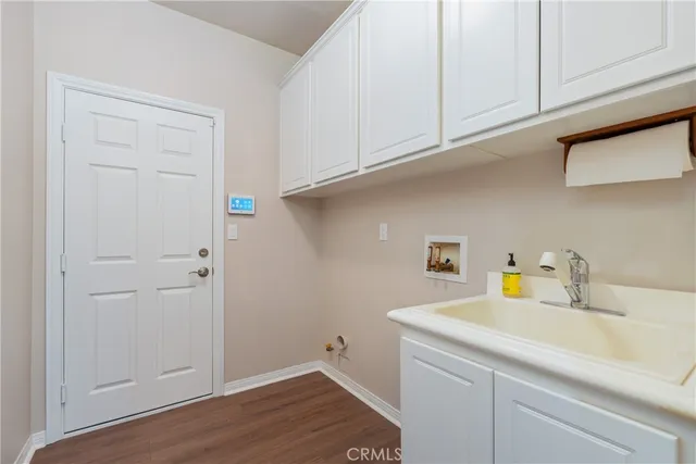 a utility room with a sink