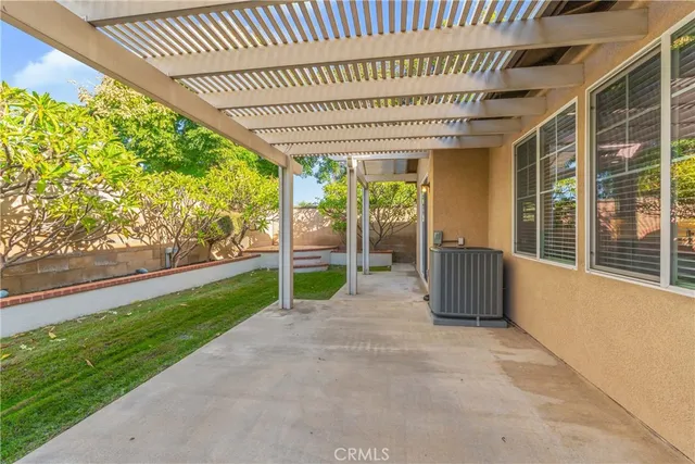 a view of a porch with wooden floor and stairs