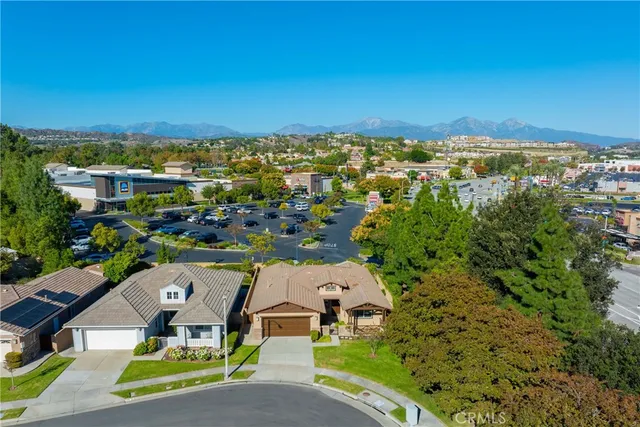an aerial view of a house with a garden