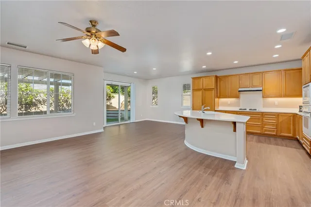 a view of workspace with furniture and window