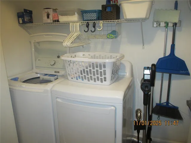 a utility room with dryer and washer