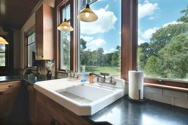 a view of living room with furniture and window