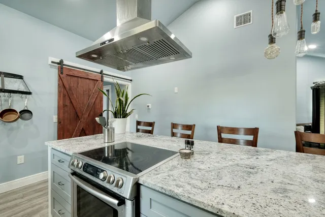 a view of a dining room with furniture
