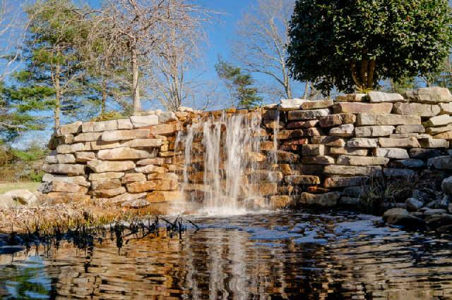 346 Parkway Road Tullahoma, TN 37388 - Photo 17 of 20 Waterfall with koi pond and arbor area