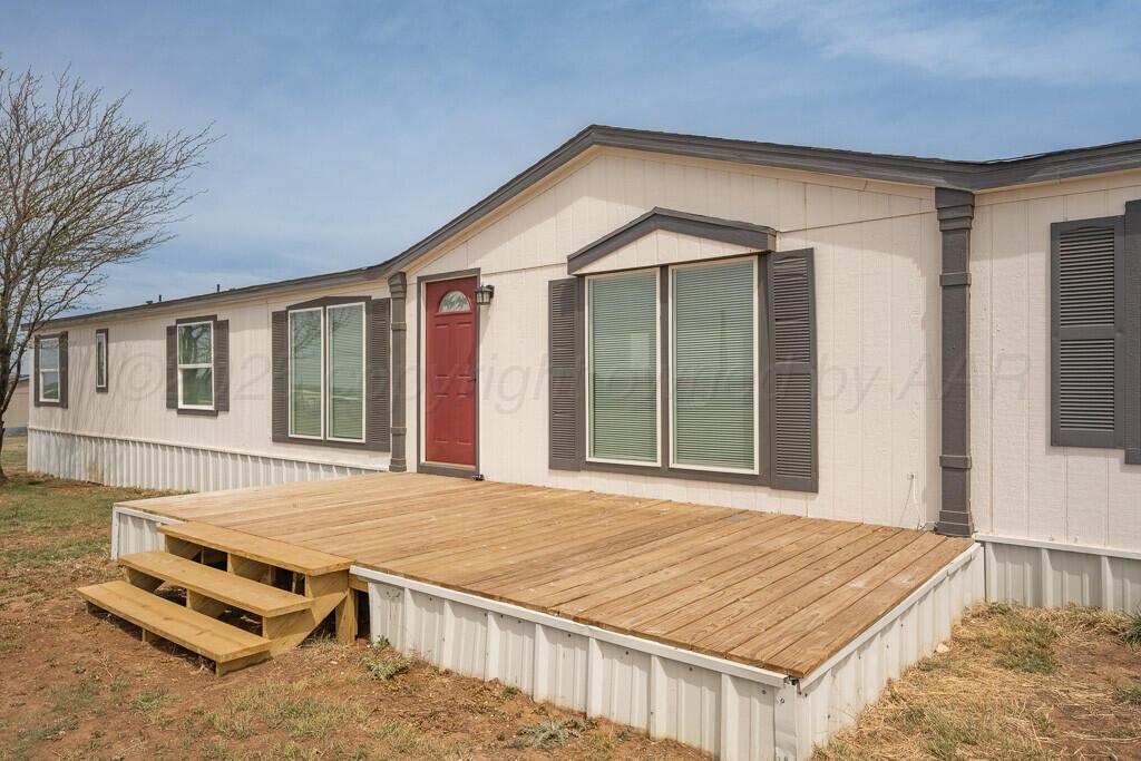 a view of backyard of house
