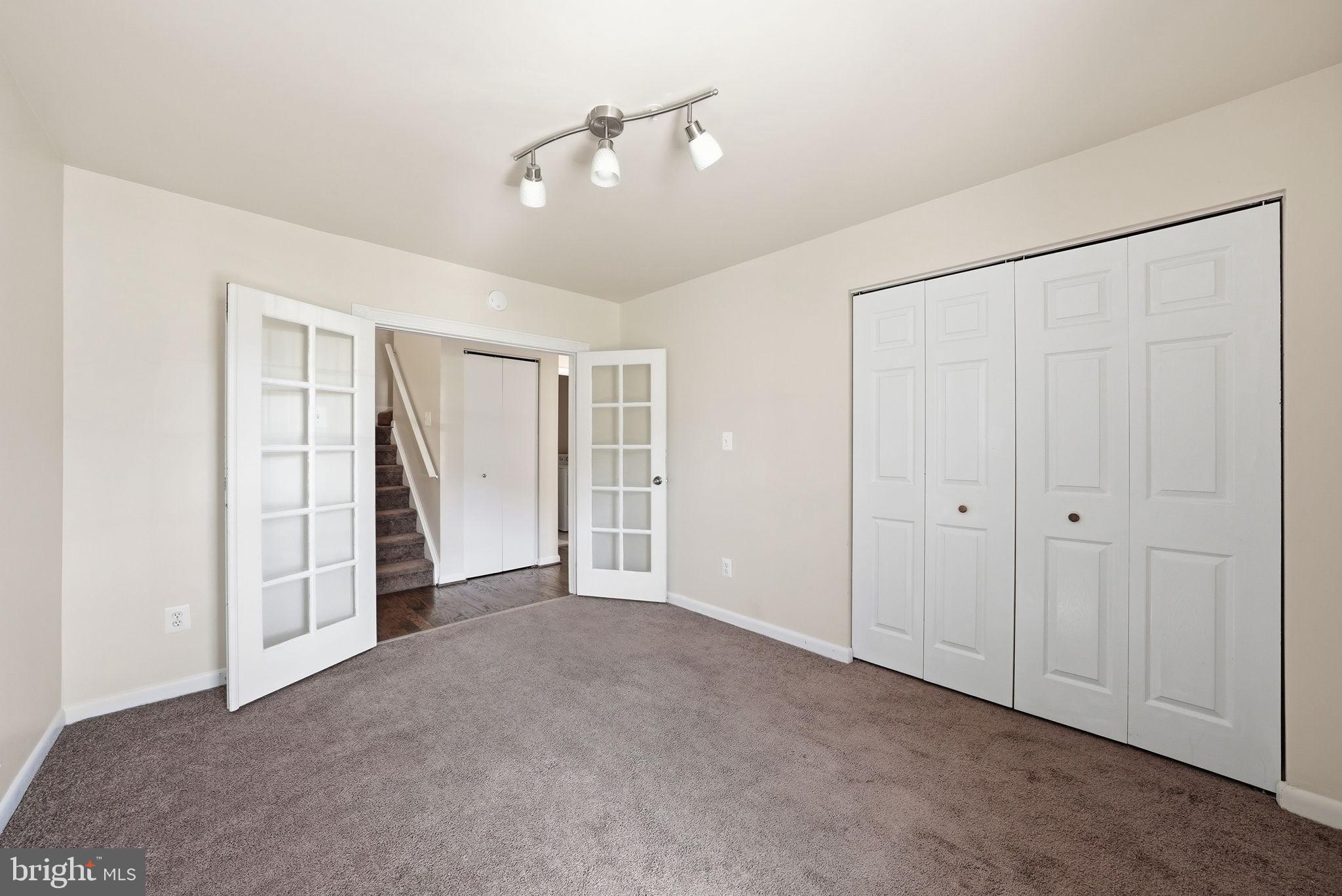 1003 Spring Valley Court Fort Washington, MD 20744 - Photo 12 of 25 a view of an empty room with a window
