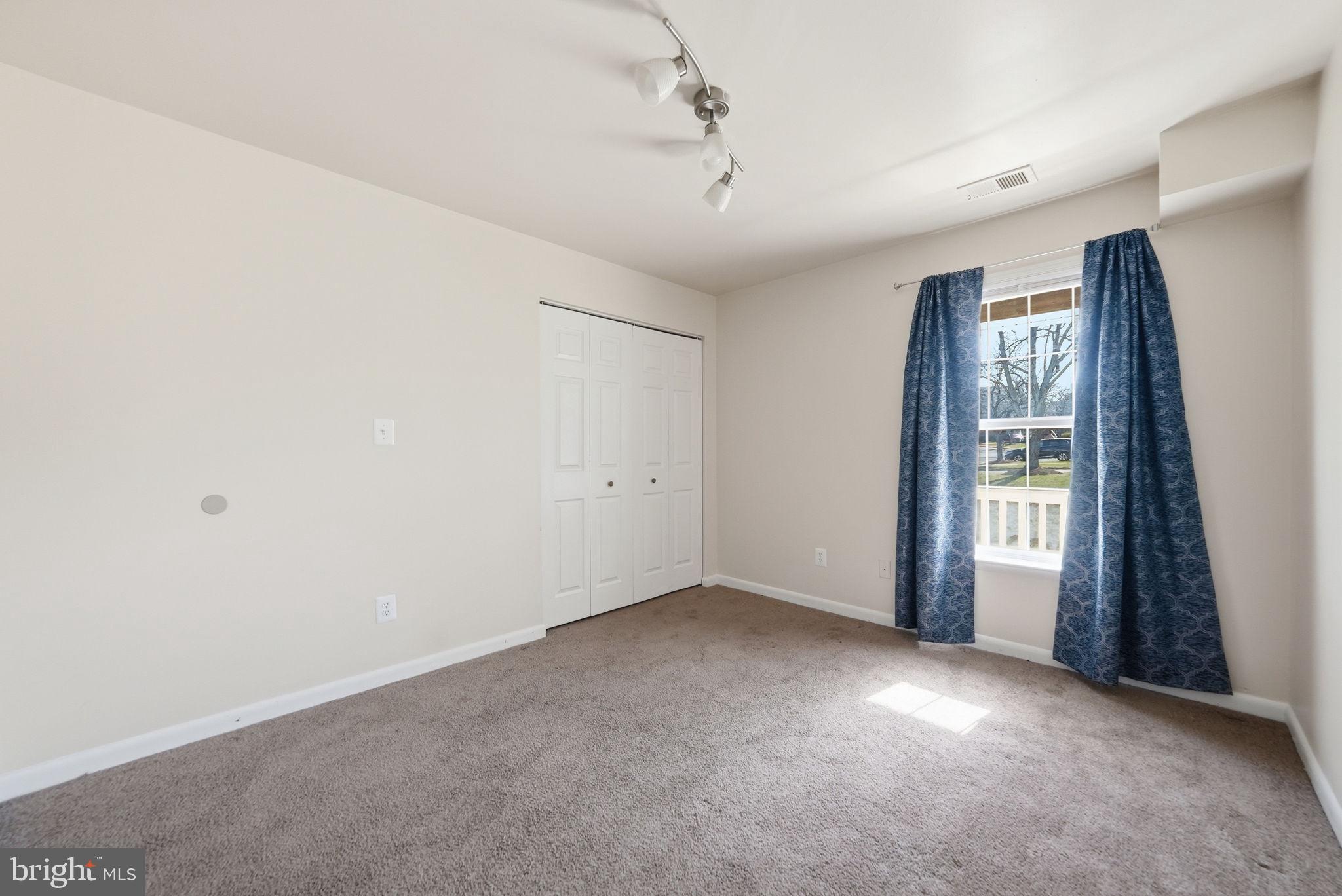 1003 Spring Valley Court Fort Washington, MD 20744 - Photo 14 of 25 a view of an empty room with a window
