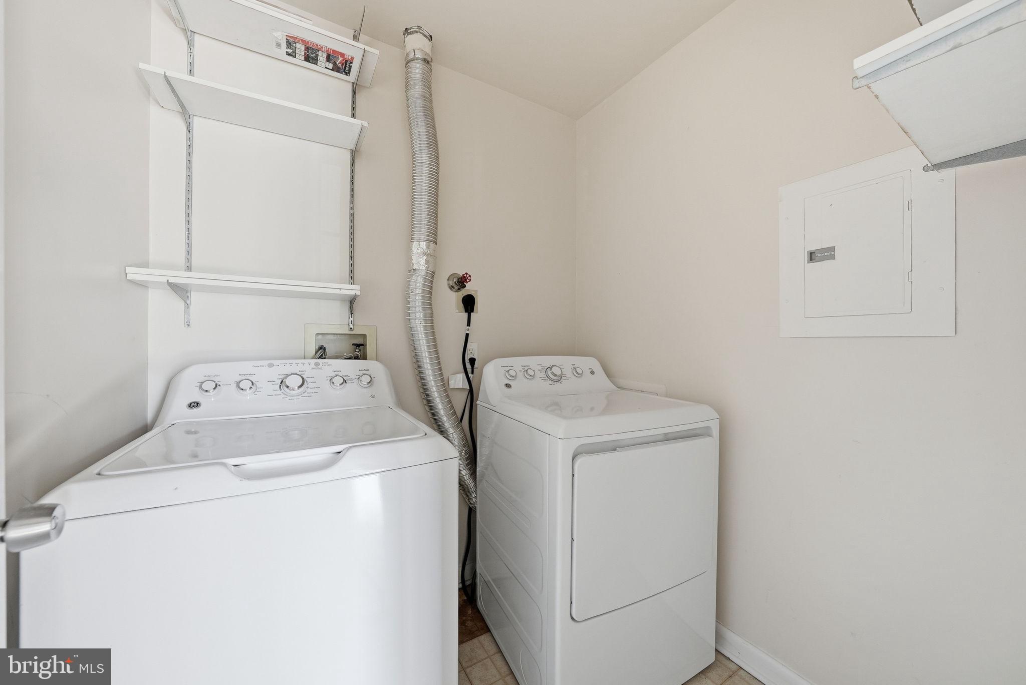 1003 Spring Valley Court Fort Washington, MD 20744 - Photo 21 of 25 a utility room with dryer and washer