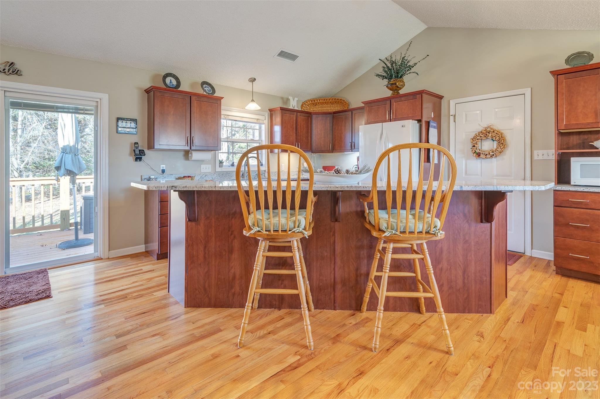 1315 Alexander Road Leicester, NC 28748 - Photo 11 of 28 a view of a dining room with furniture and wooden floor