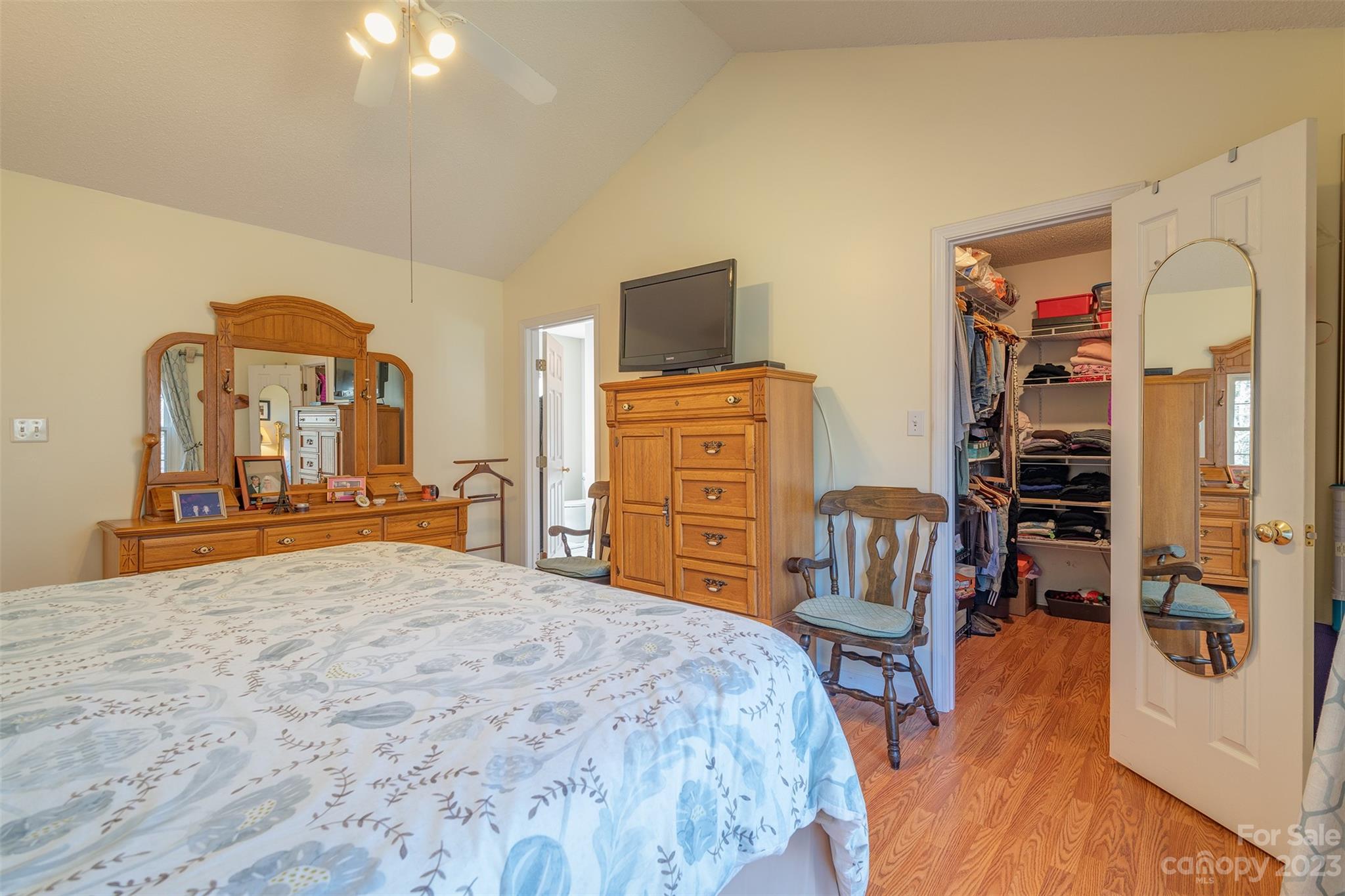 1315 Alexander Road Leicester, NC 28748 - Photo 16 of 28 a bedroom with a bed and a flat screen tv