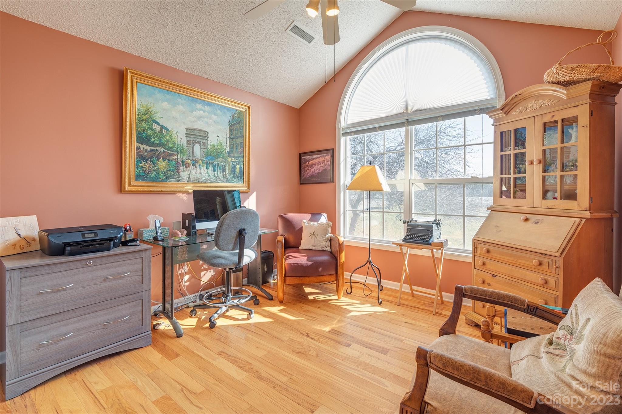 1315 Alexander Road Leicester, NC 28748 - Photo 20 of 28 a view of a livingroom with workspace and a window