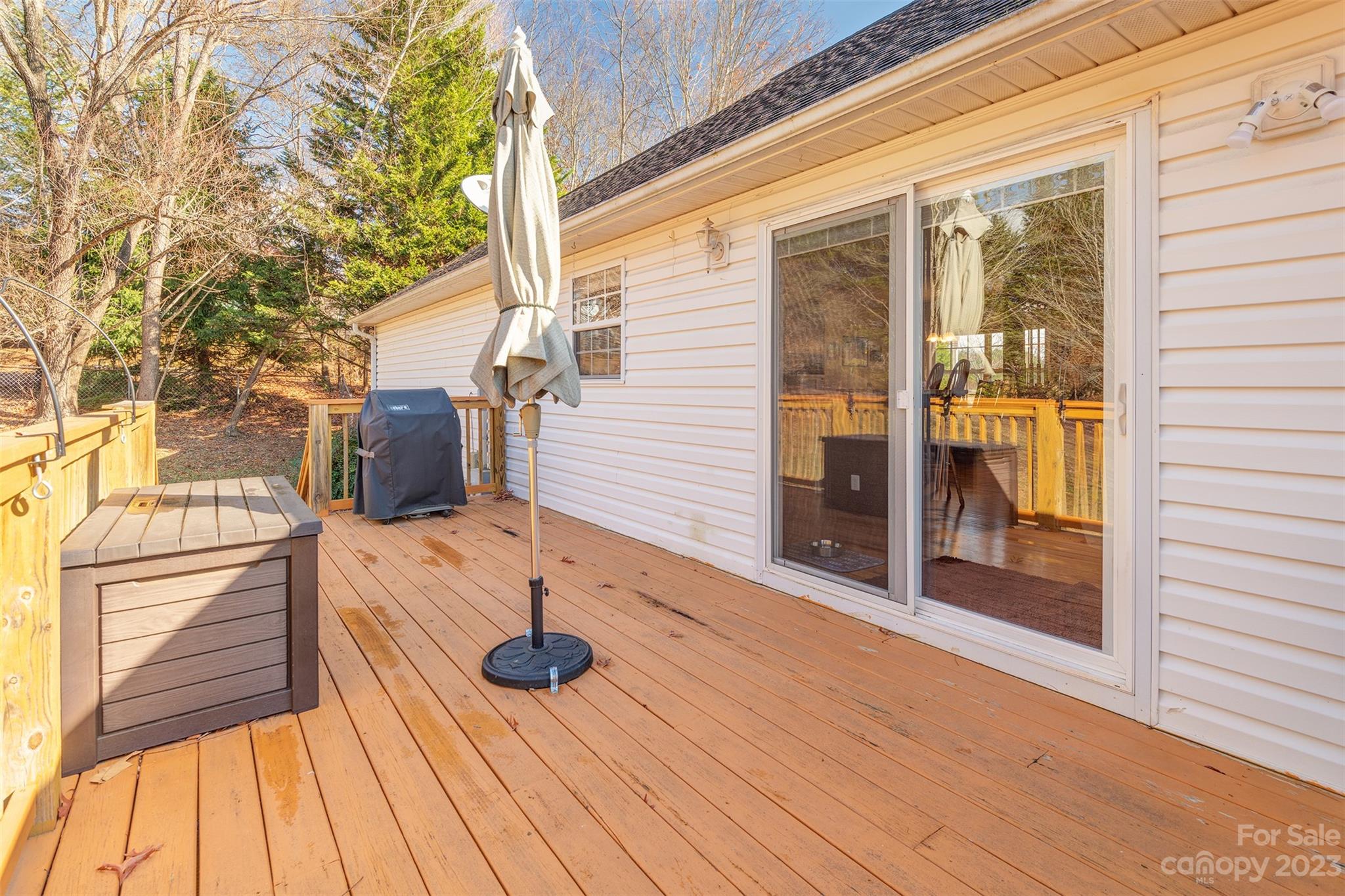 1315 Alexander Road Leicester, NC 28748 - Photo 24 of 28 a view of balcony with wooden floor and fence