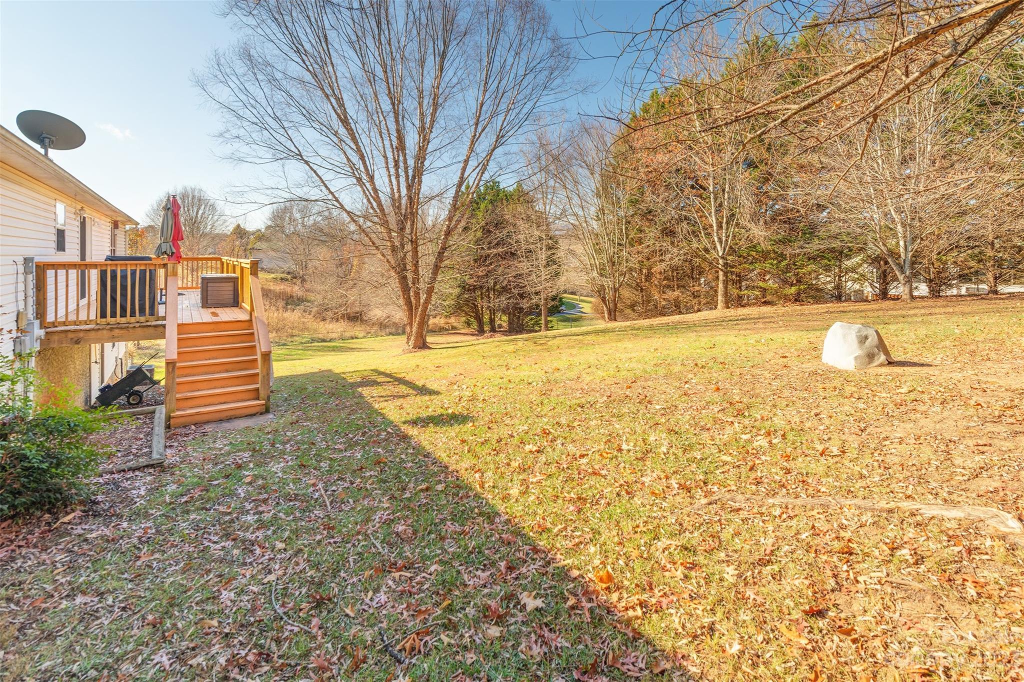 1315 Alexander Road Leicester, NC 28748 - Photo 26 of 28 a view of a yard with an outdoor space