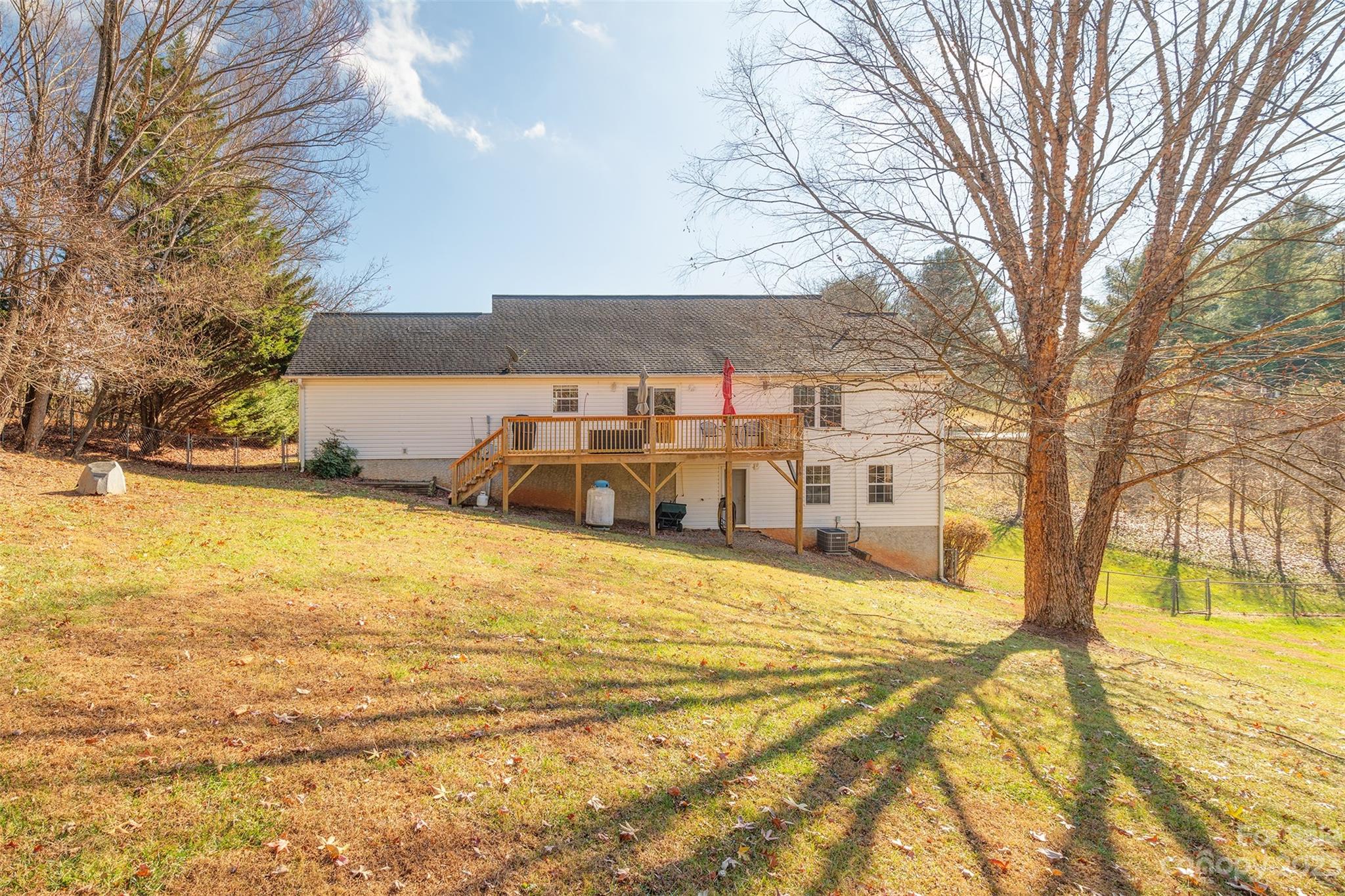 1315 Alexander Road Leicester, NC 28748 - Photo 27 of 28 a large pool of the house with large trees