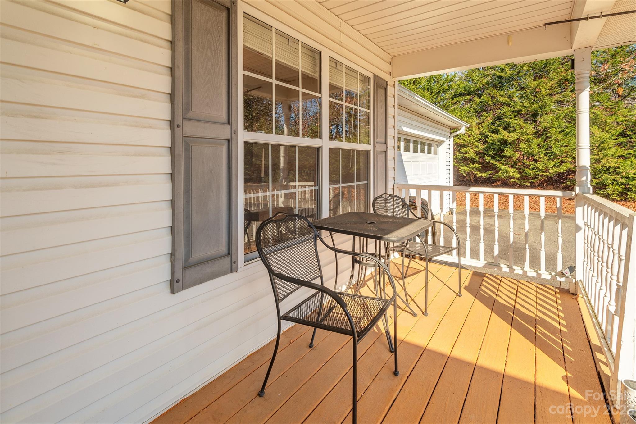 1315 Alexander Road Leicester, NC 28748 - Photo 3 of 28 a view of a chairs and table in the balcony