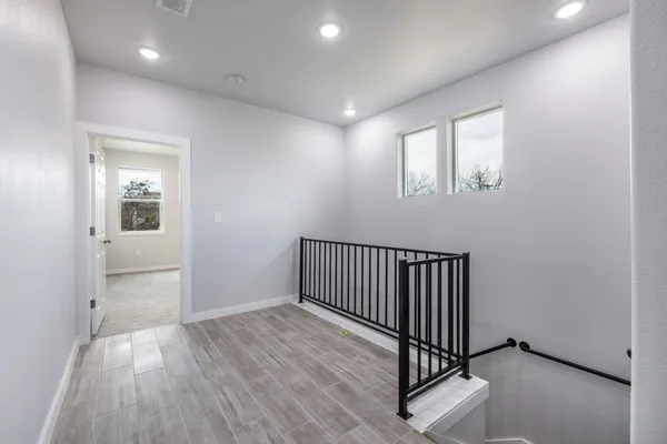 a view of a hallway with entryway