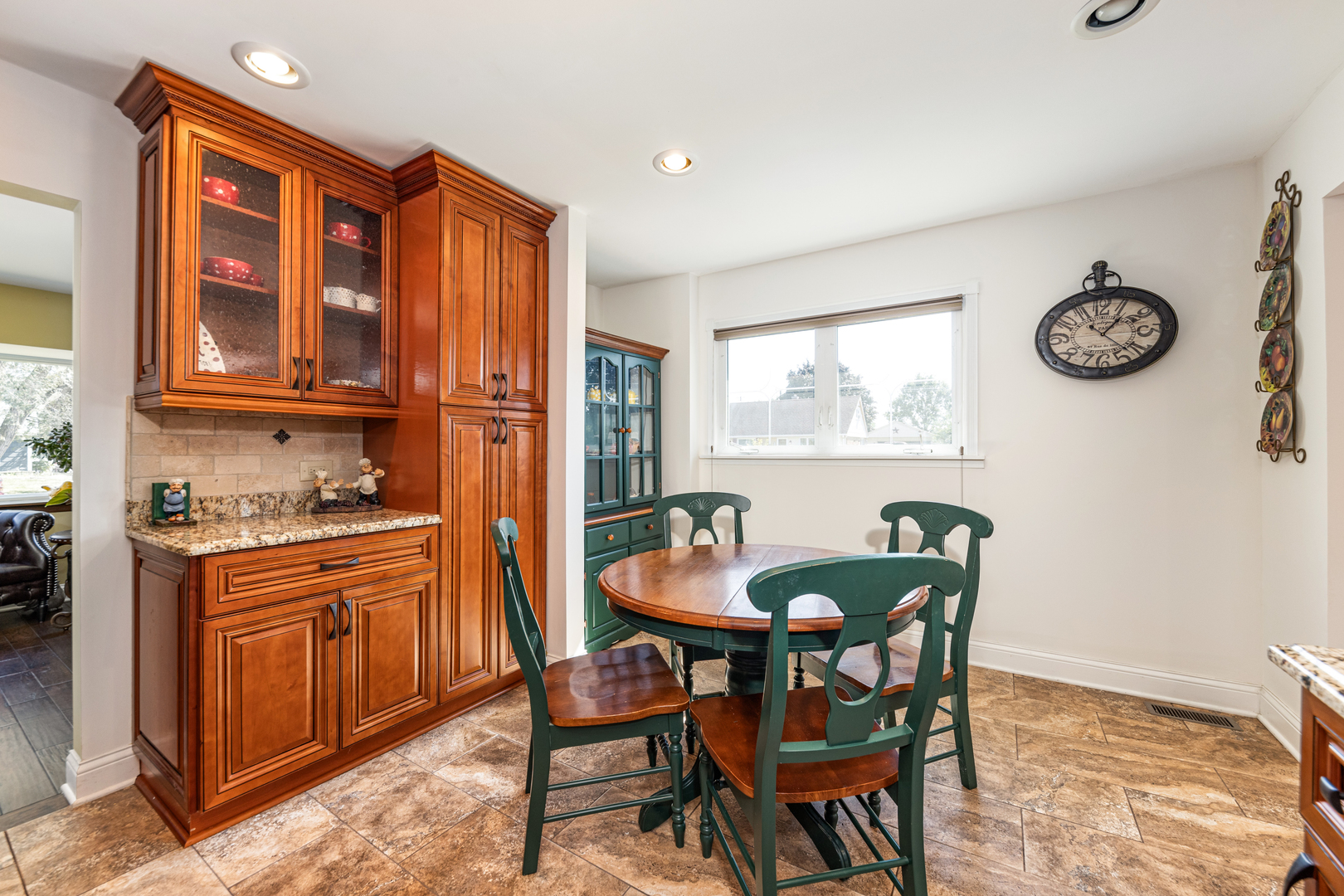 9236 Pembroke Lane Bridgeview, IL 60455 - Photo 20 of 40 a dining room with furniture and window
