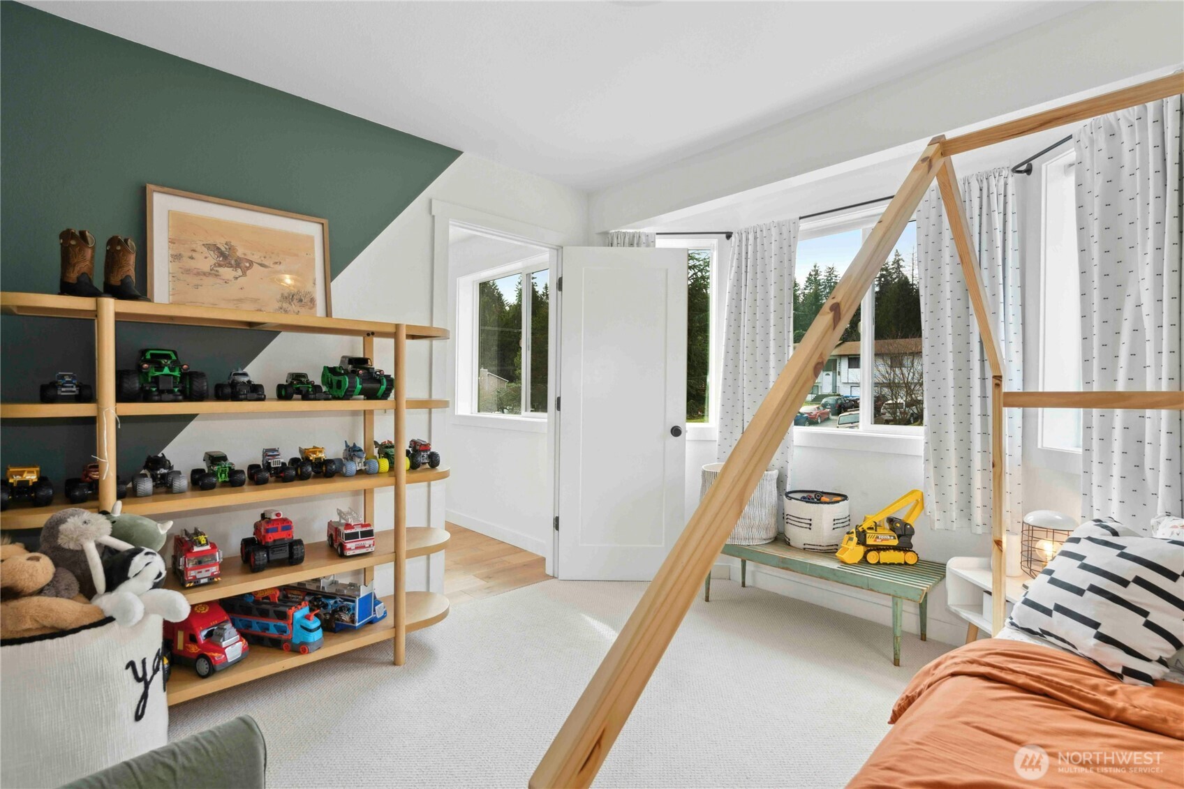 22629 4th Avenue Southeast Bothell, WA 98021 - Photo 18 of 29 a bedroom with furniture and a large window