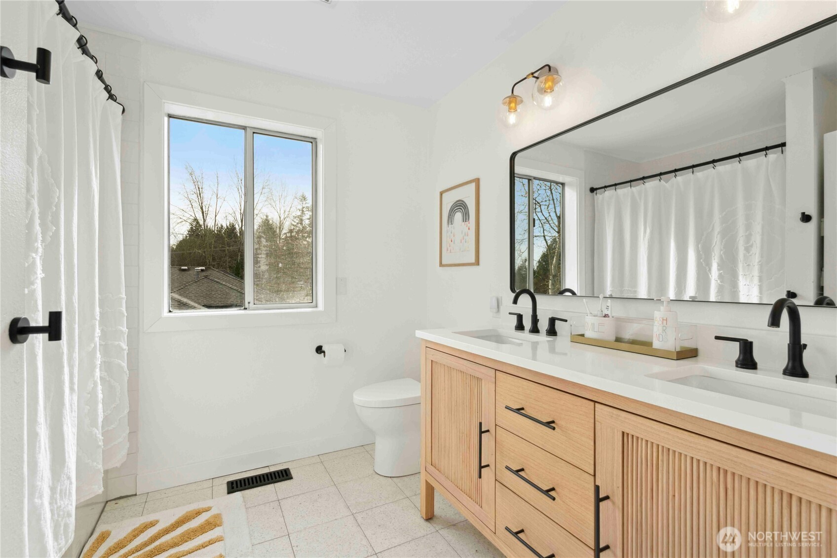 22629 4th Avenue Southeast Bothell, WA 98021 - Photo 20 of 29 a bathroom with a double vanity sink a mirror and a toilet