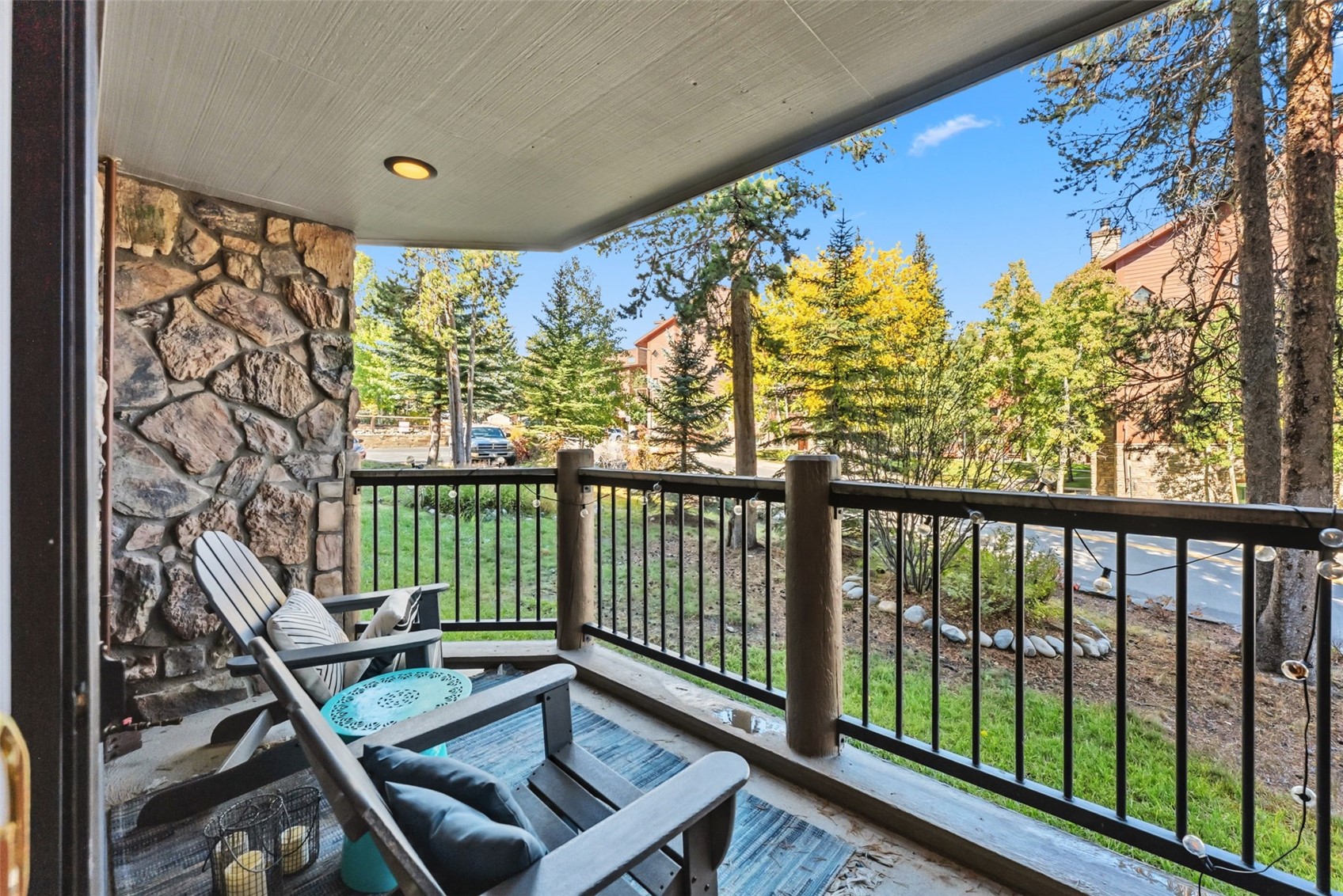 325 Four O Clock Road North, Unit B103 Breckenridge, CO 80424 - Photo 1 of 19 a view of a balcony with furniture