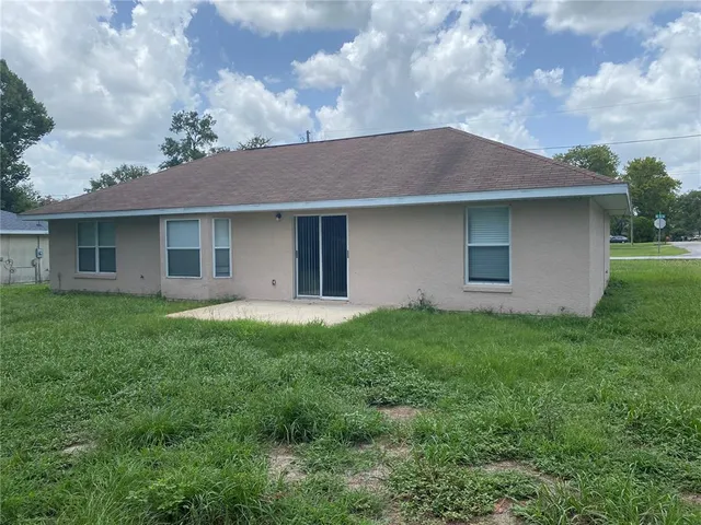 a house view with a garden space