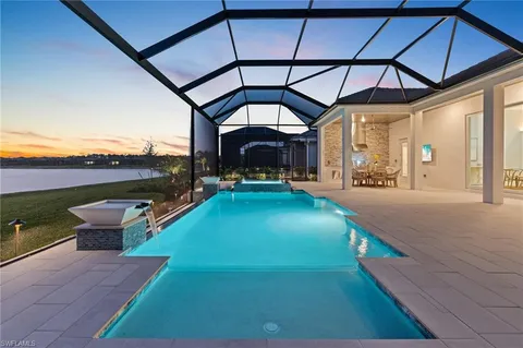 a swimming pool with an outdoor seating yard and roof