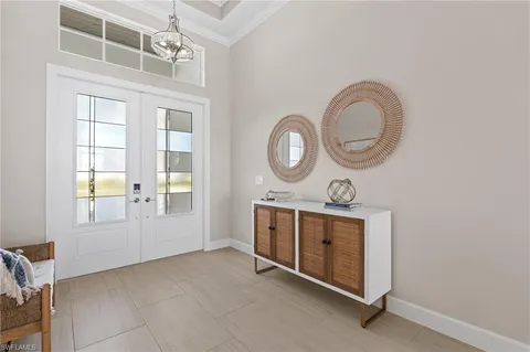 a view of an entryway with wooden floor