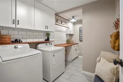 a white toilet sitting next to a bathroom sink