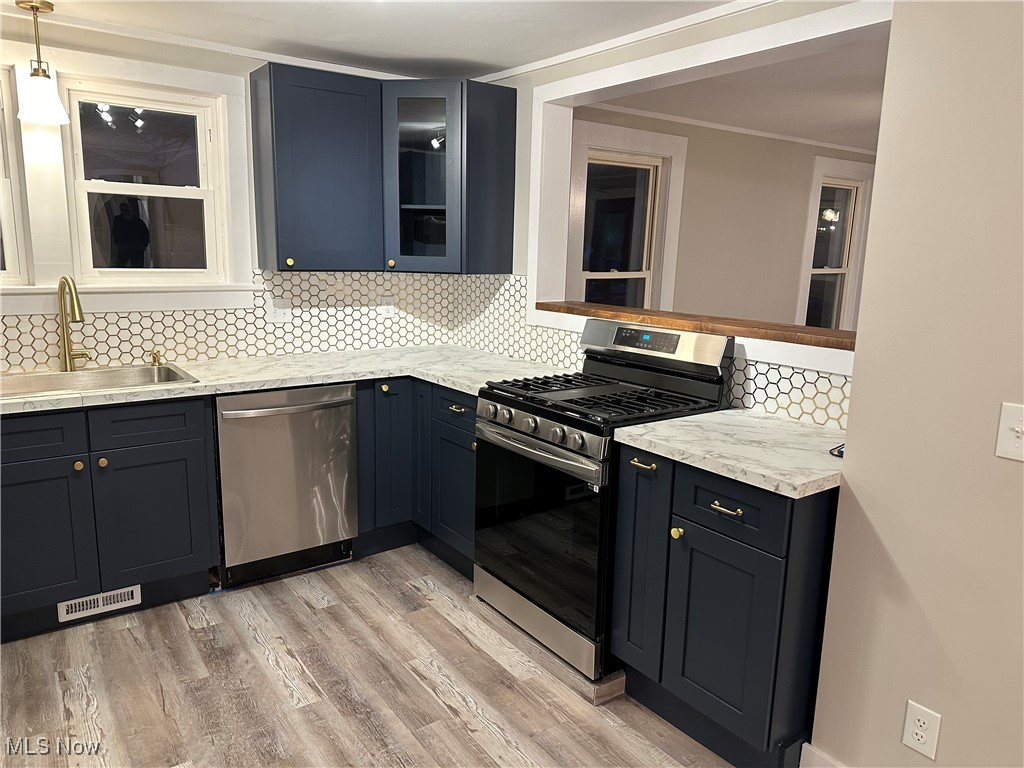 5258 Lockwood Road Madison, OH 44057 - Photo 4 of 39 Brand new kitchen with beautiful finishes