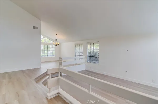 a spacious bathroom with a bathtub and window