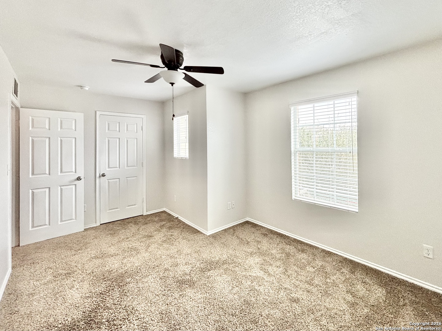 9358 Fisherman Converse, TX 78109 - Photo 13 of 22 a view of an empty room with a window