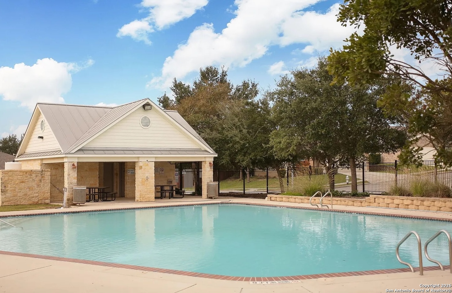 9358 Fisherman Converse, TX 78109 - Photo 19 of 22 a view of a house with a swimming pool