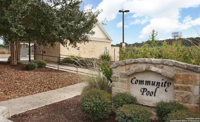a picture of a book and a white wall